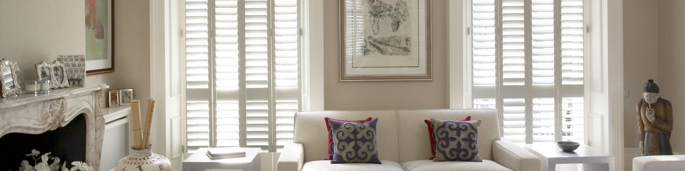 white-painted-wood-shutters