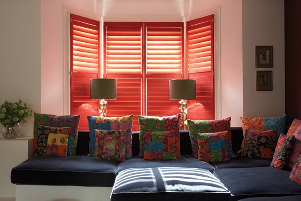 Red suede-covered Manhattan shutters