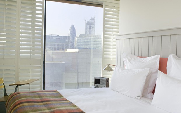Views through the open shutters from the bedrooms at Shoreditch House