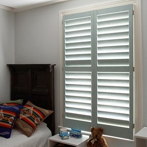 blue-shutters-bedroom