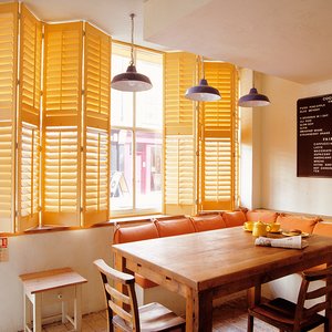 yellow-plantation-shutters