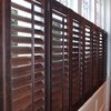 Bespoke shutters in a distressed faux leather finish