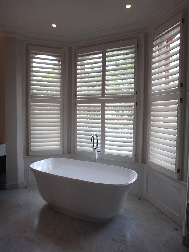 Manhattan shutters in bathroom designed by Oliver Bea Interior Design